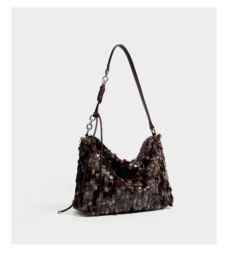 Slouchy paillette sequin hobo shoulder bag with zip closure and adjustable leather-look strap with silver chain hardware