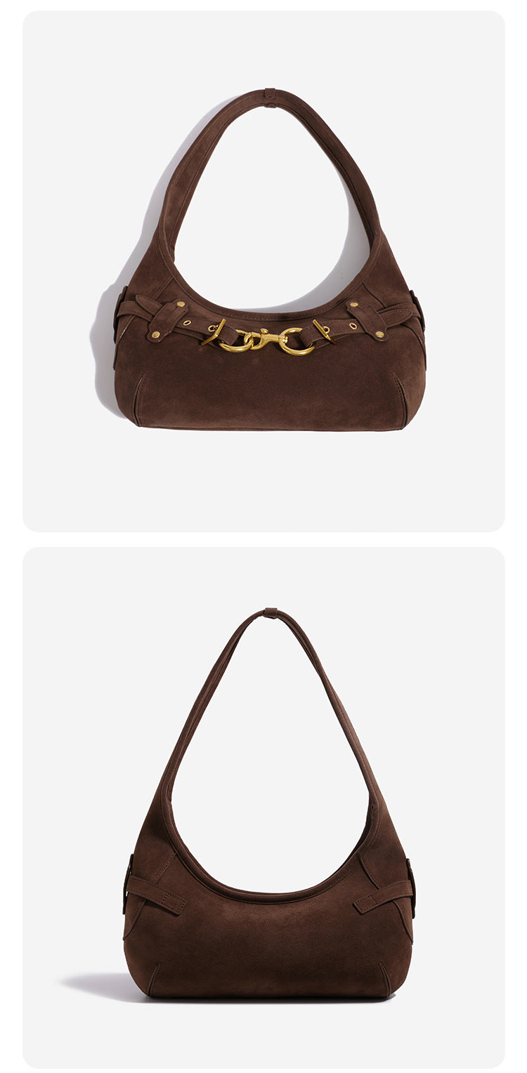 Slouchy hobo shoulder bag with gold-tone ring-and-buckle front hardware, zip top closure, and matte textured finish, detail
