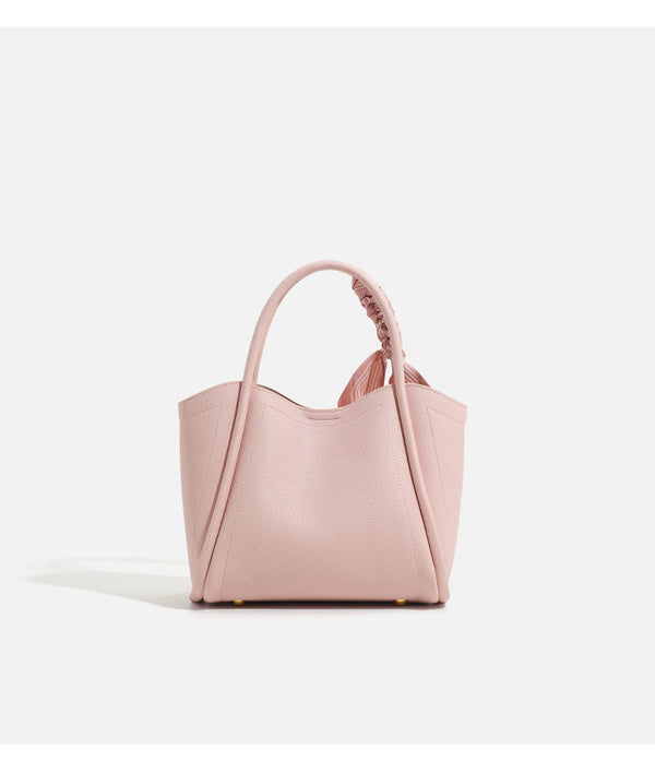 Pebbled leather-look bucket tote bag with scarf-wrapped top handle and gold-tone hardware, detail view 13