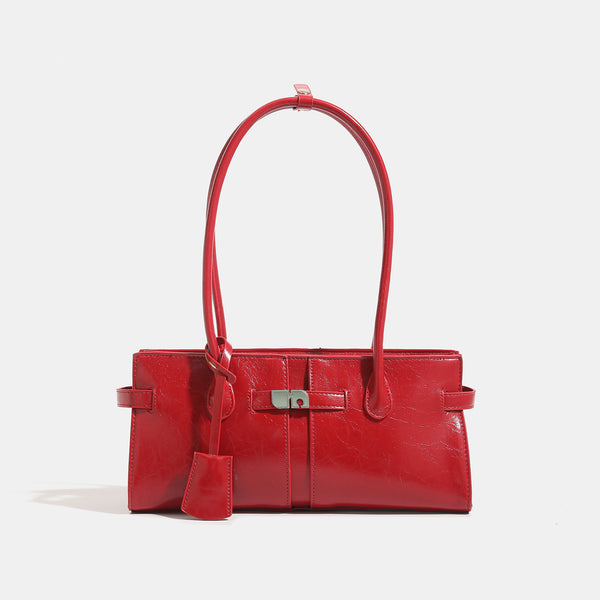 Structured glossy leather-look tote bag with long loop handles and silver turn-lock buckle closure, detail view 7
