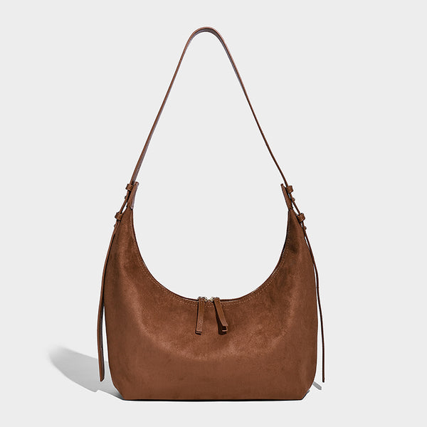 Slouchy crescent hobo shoulder bag in dark chocolate matte suede-look finish with adjustable strap and twin-pull top zip