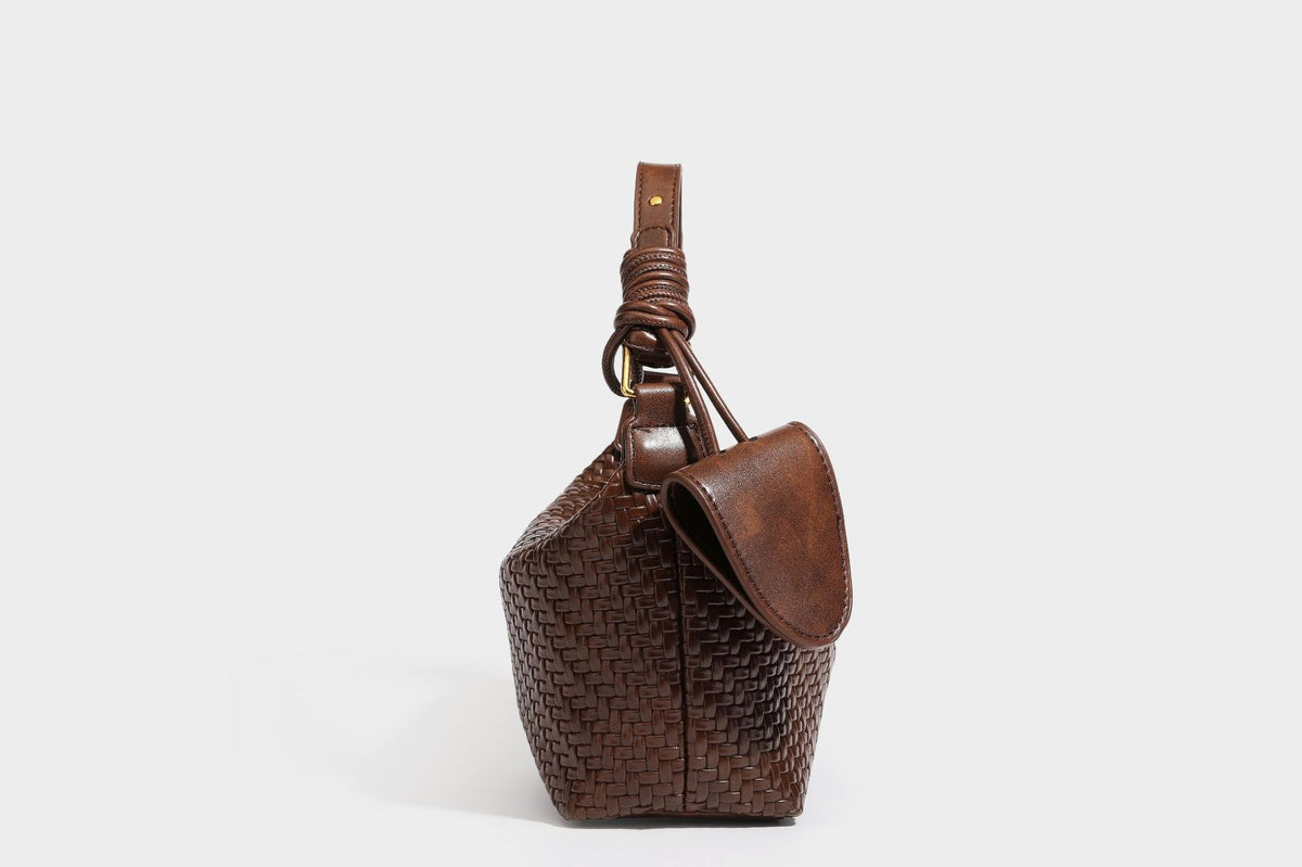 Small glossy basket-weave hobo shoulder bag in brown with knotted top handle, flap accent pocket, and gold-tone hardware