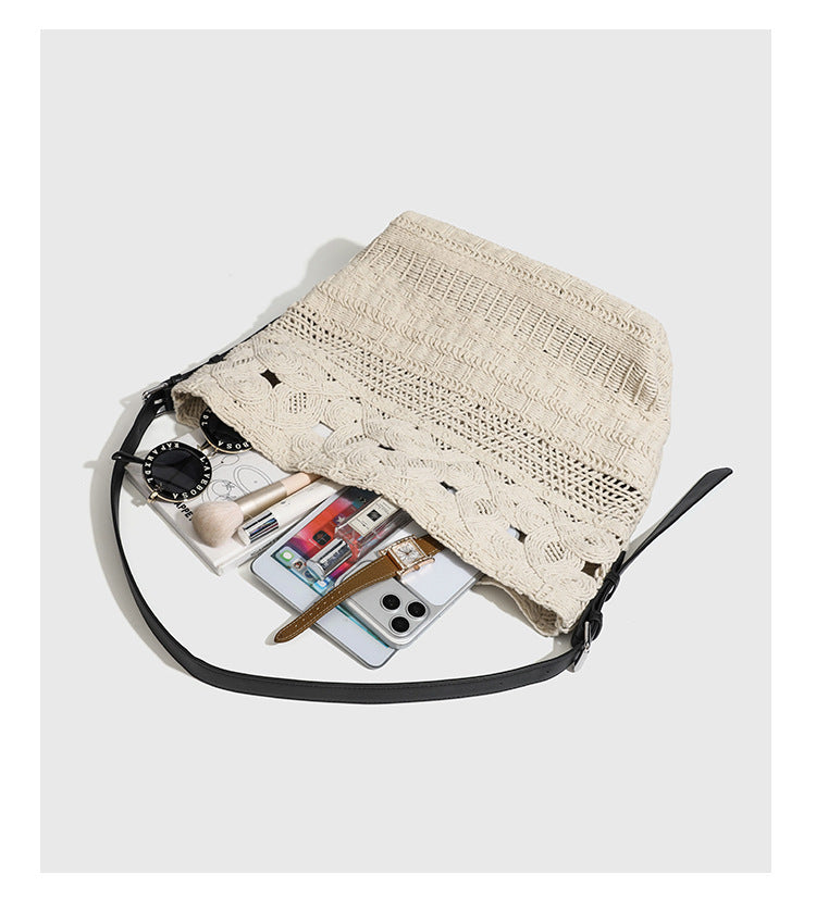 Cream woven rope-cord hobo bag with black adjustable leather-look strap and matching cream drawstring pouch, detail view 13