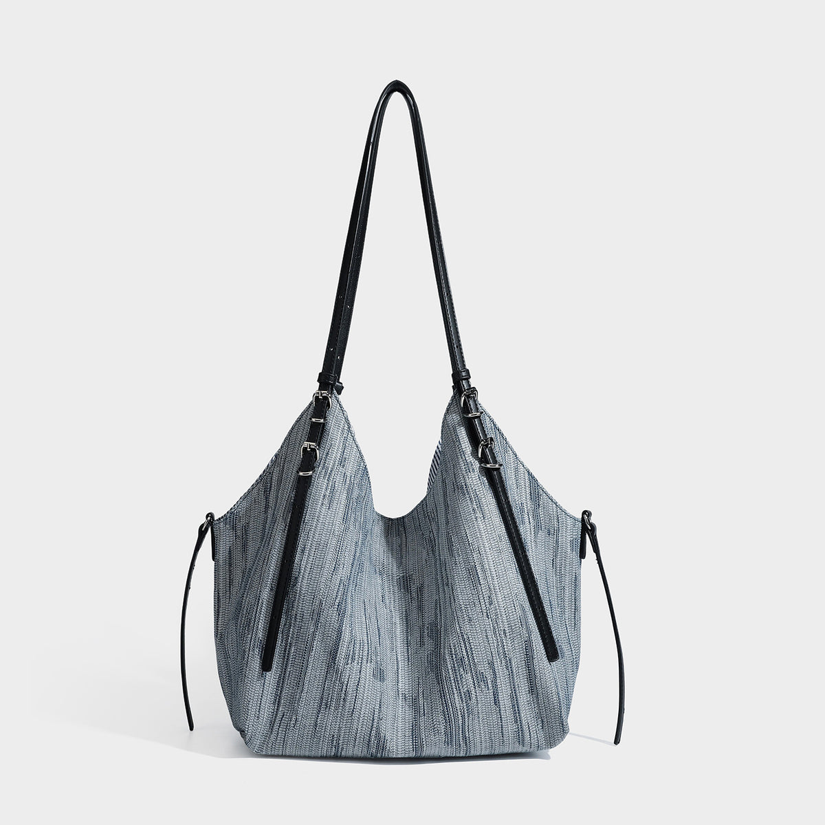Large slouchy woven-texture shoulder tote bag with slim leather-look straps, side cinch ties, and silver-tone hardware