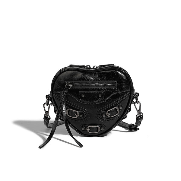 Mini heart-shaped crossbody bag with glossy crinkled finish and moto buckle hardware, detail view 15