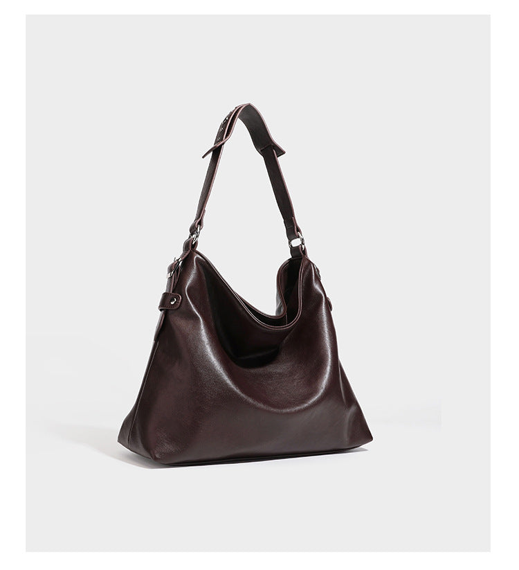 Large slouchy hobo shoulder bag in dark brown with smooth leather-look finish, adjustable strap, and silver-tone hardware