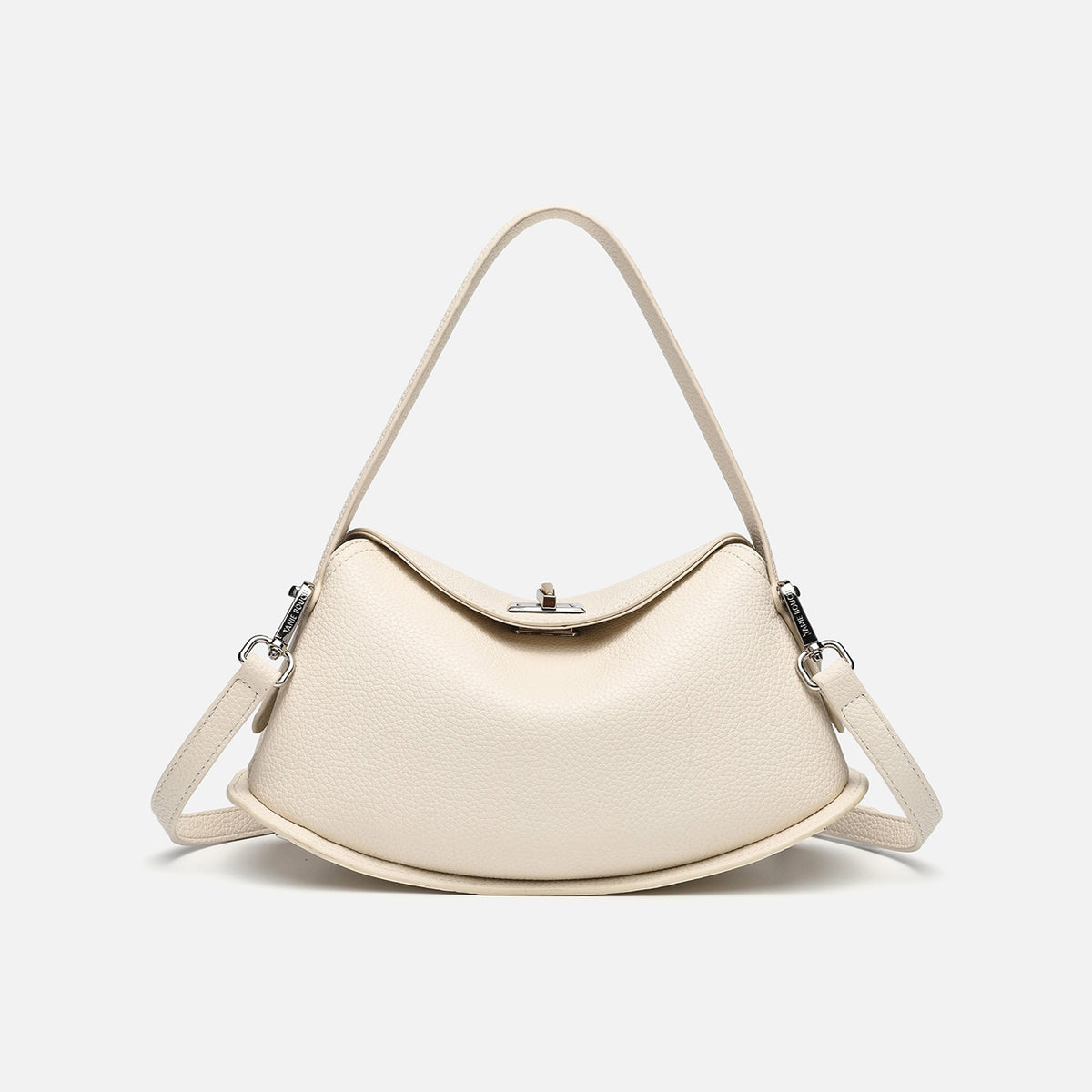 Pebbled leather-look half-moon saddle bag with turn-lock flap closure, top handle, and detachable crossbody strap, front view
