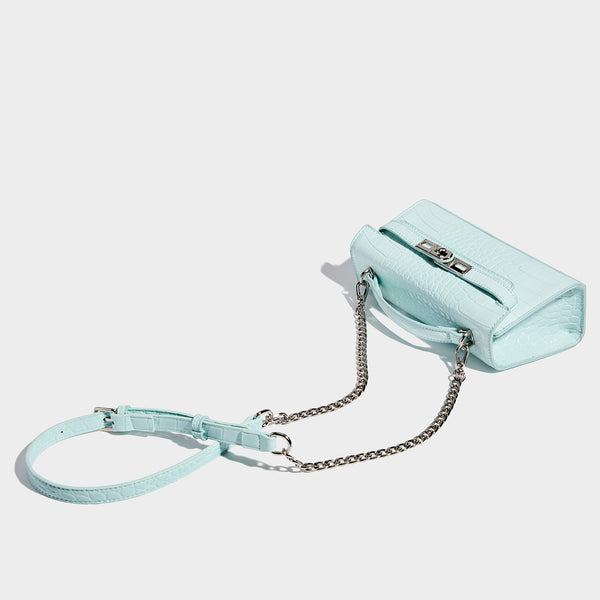 Compact structured flap satchel with glossy crocodile-embossed leather-look finish, silver-tone turn-lock hardware, and
