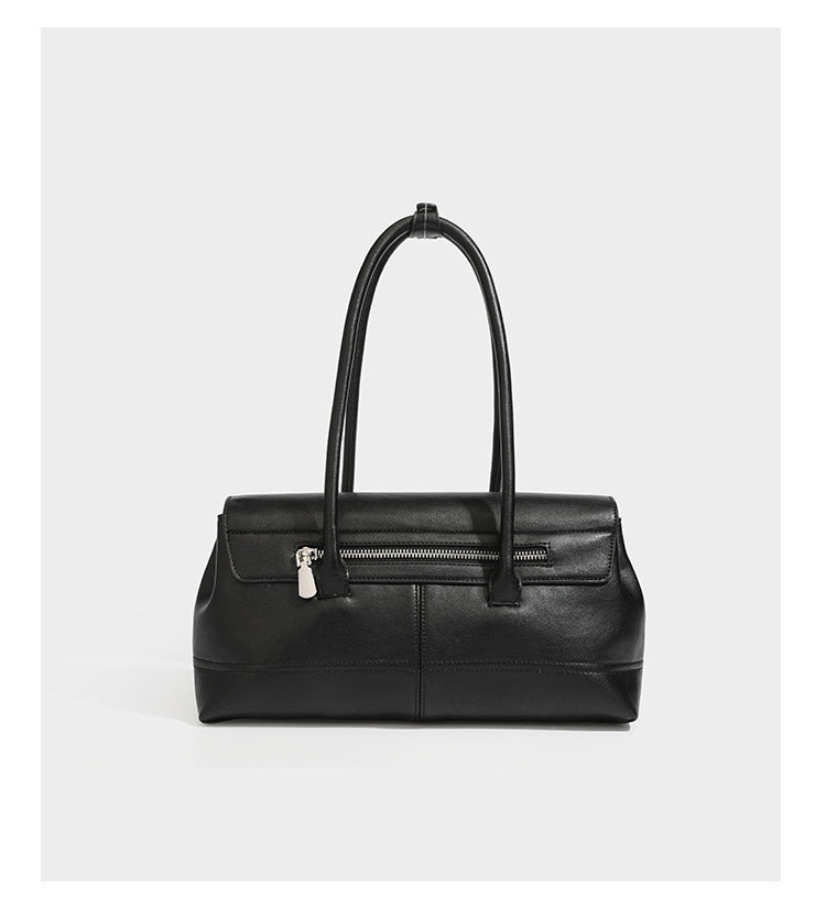 Structured rectangular satchel bag with dual rounded top handles and central metal turn-lock flap closure, detail view 15