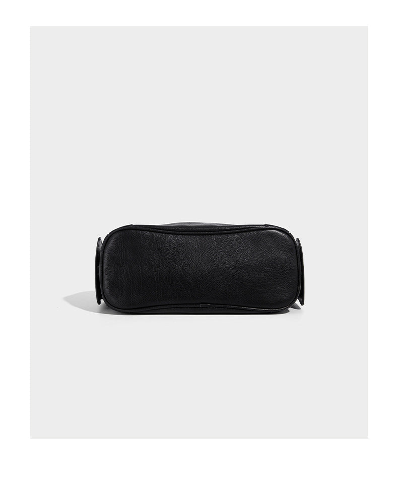 Soft pebbled leather-look hobo shoulder bag with zip top closure, side flap pockets, and silver-tone hardware, detail view 12