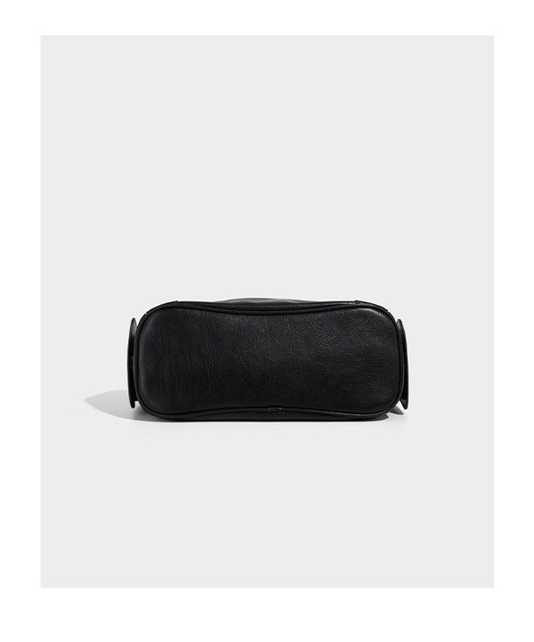 Soft pebbled leather-look hobo shoulder bag with zip top closure, side flap pockets, and silver-tone hardware, detail view 12