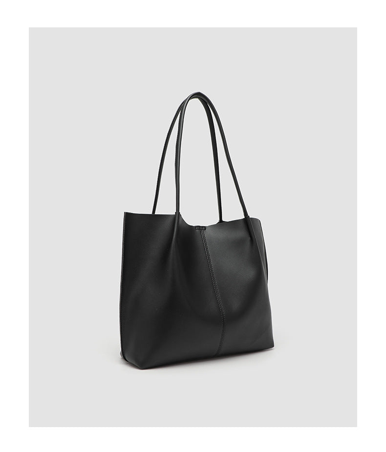 Large slouchy matte leather-look tote bag with double shoulder straps and centre seam detail, detail view 9