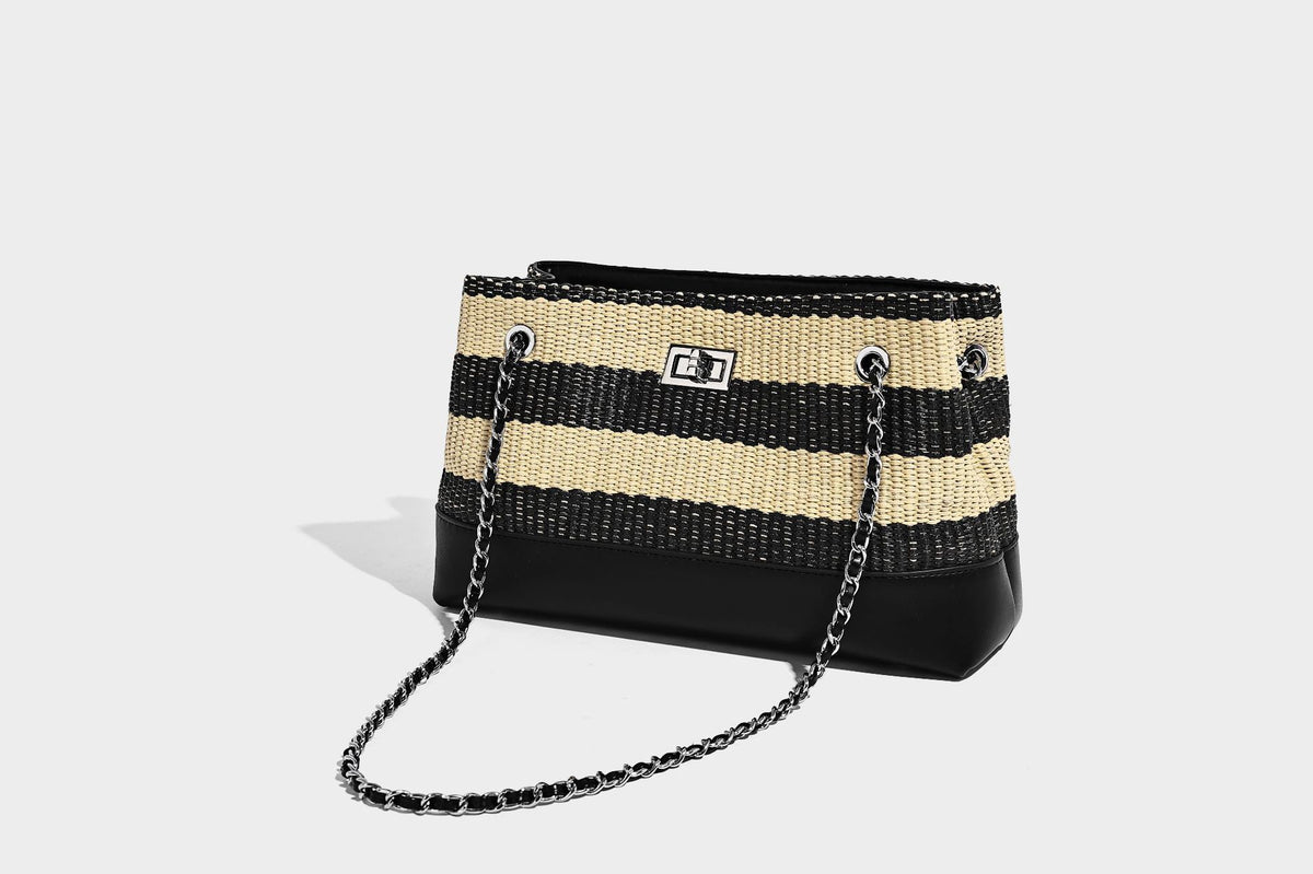 Structured black and beige striped woven shoulder bag with silver chain strap and turn-lock metal clasp, detail view 18
