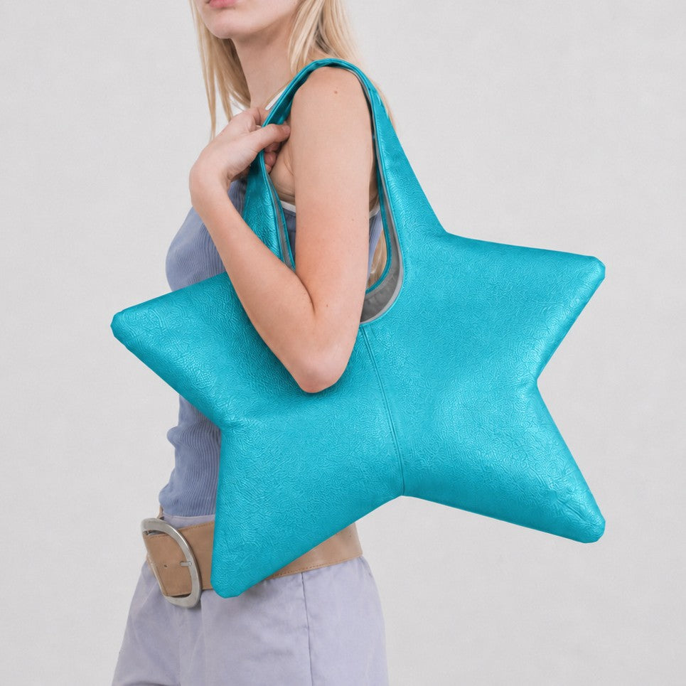 Star-shaped soft tote bag with U-shaped loop handle in textured leather-look finish, detail view 2