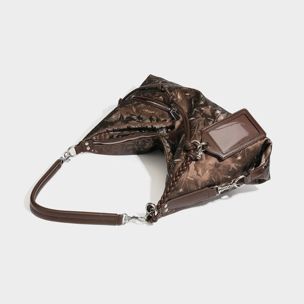 Slouchy hobo shoulder bag in crinkled metallic brown leather-look finish with braided rope knots, silver-tone hardware