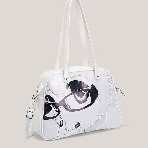 Strukturierte Tote-Bag in glänzendem Weiß mit schwarz-weißem Anime-Gesicht als Grafikprint, Reißverschluss oben und zwei Henkeln, Detailansicht