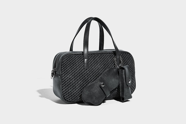 Structured woven-texture front top-handle handbag with zip closure, dual handles, detachable shoulder strap, and matching