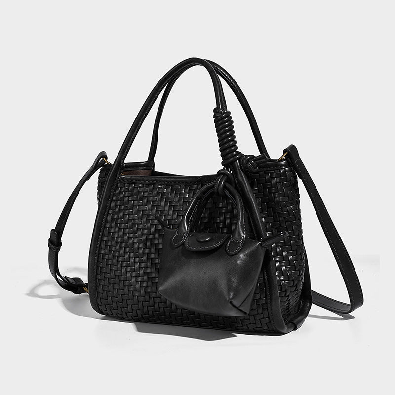 Woven texture open-top tote bag with smooth trim top handles and attached mini drawstring pouch in dark brown, detail view 3