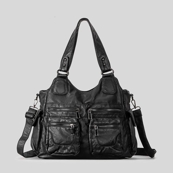 Große schwarze Hobo-Schultertasche in Used-Lederoptik mit mehreren Reißverschlussfächern auf der Vorderseite, zwei Tragegriffen und abnehmbarem