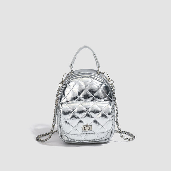 Quilted leather-look backpack purse with chain strap and turn-lock front pocket, detail view 6