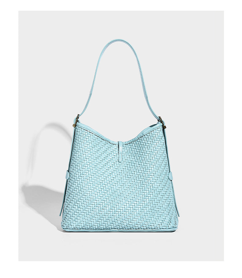 Slouchy woven-texture bucket shoulder bag with tassel tie closure and gold-tone hardware, detail view 17
