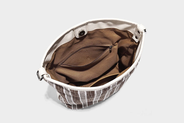 Large striped canvas hobo shoulder bag with cream trim and silver-tone hardware, detail view 24