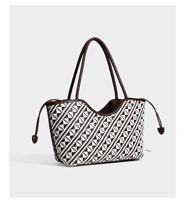 Woven geometric two-tone tote bag with braided shoulder straps and leather-look trim, detail view 12