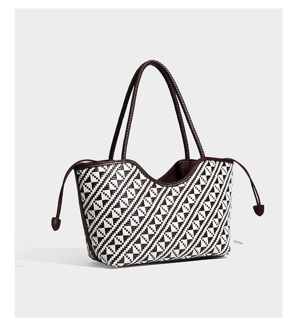 Woven geometric two-tone tote bag with braided shoulder straps and leather-look trim, detail view 12