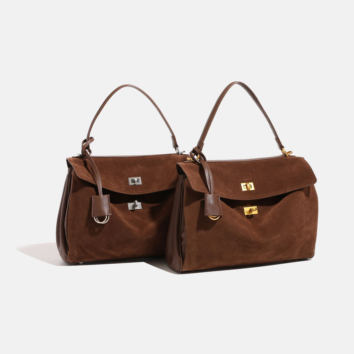Strukturierte Henkeltasche im Satchel-Stil mit Wildlederoptik in Braun, goldfarbenem Drehverschluss, Tragegriff und abnehmbarem Schulterriemen