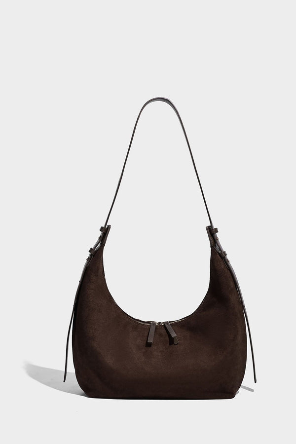 Slouchy crescent hobo shoulder bag in dark chocolate matte suede-look finish with adjustable strap and twin-pull top zip