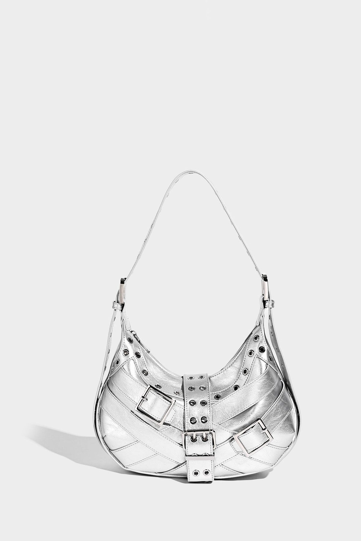 Glossy crescent hobo bag with silver-tone grommets, square buckle straps, and top zipper closure, detail view 13
