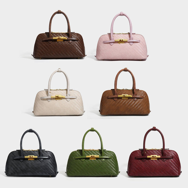 Structured woven-embossed leather-look satchel with dual rolled top handles, gold-tone turn-lock closure, and detachable