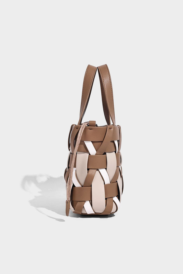Small structured woven lattice tote bag with dual top handles and detachable shoulder strap in brown and cream leather-look