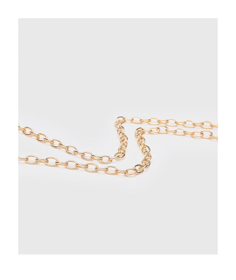 Structured glitter envelope clutch bag with gold-tone V-bar hardware and detachable chain strap, detail view 16