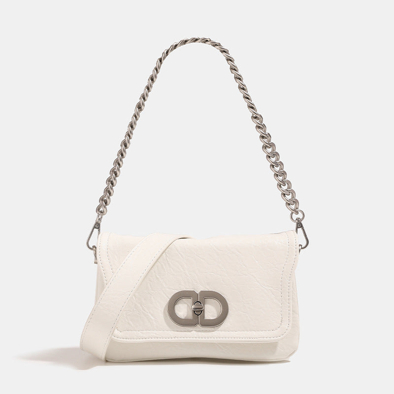 Rectangular flap shoulder bag with chunky silver-tone chain strap and crinkled leather-look finish, detail view 6