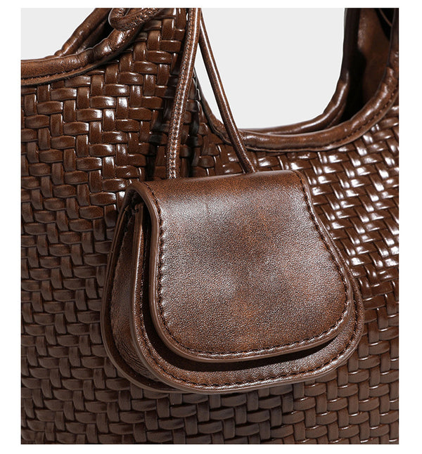 Woven leather-look tote bag in mocha brown with knotted top handle, front flap pocket, and detachable crossbody strap with
