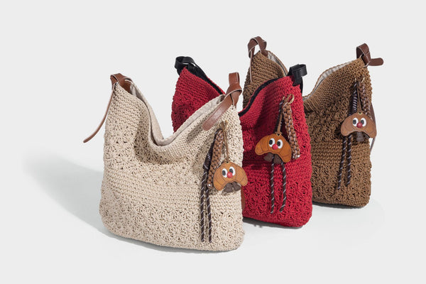 Lässige, gewebte Häkelschultertasche mit verstellbarem Schulterriemen in Cognac-Lederoptik und Druckknopfverschluss, Detailansicht 32