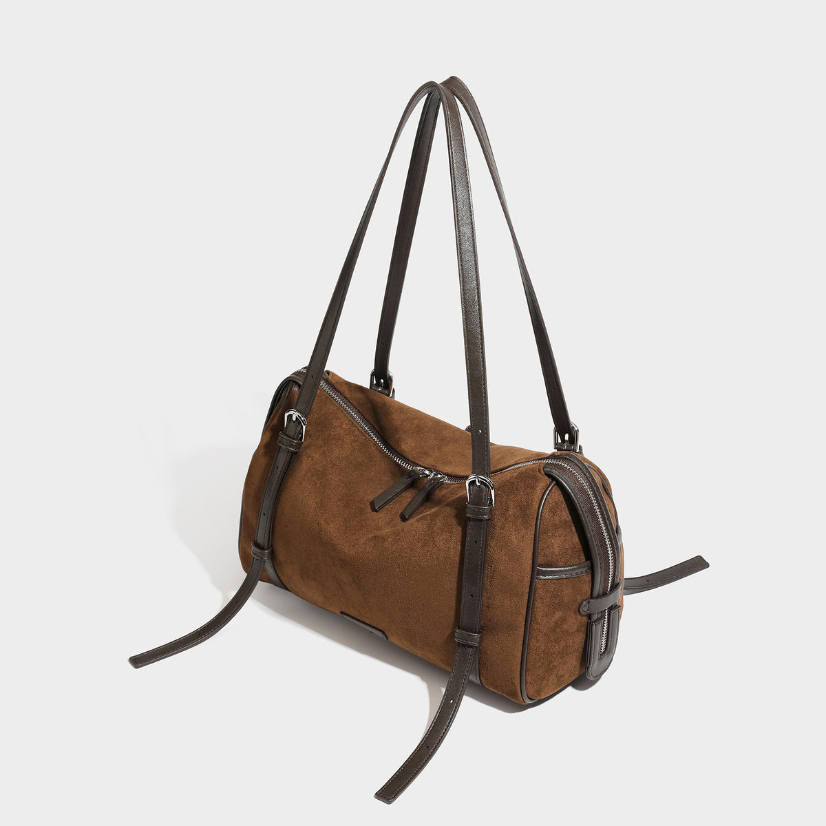 Large brown suede-finish barrel shoulder bag with dark leather-look trim, silver-tone zippers, dual top handles, and long