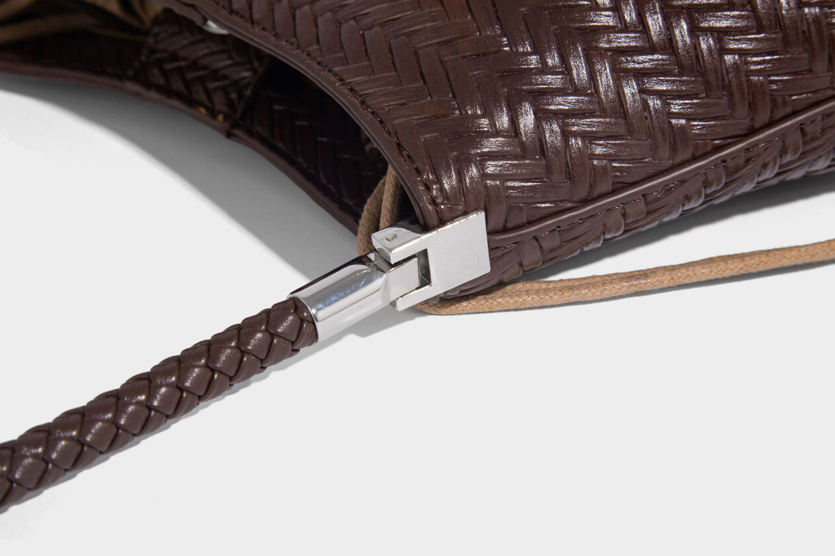 Woven leather-look hobo shoulder bag with braided strap and silver-tone hardware, detail view 25