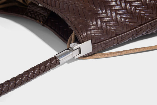 Woven leather-look hobo shoulder bag with braided strap and silver-tone hardware, detail view 25
