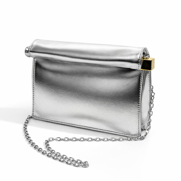 Structured rectangular clutch bag with rolled-top bar closure, gold-tone and silver-tone mixed metal hardware, detail view 9