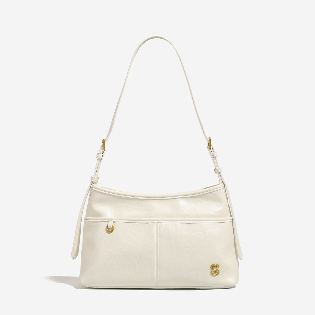 Relaxed leather-look shoulder tote bag in cream white with front exterior pocket, gold-tone ring hardware, and adjustable