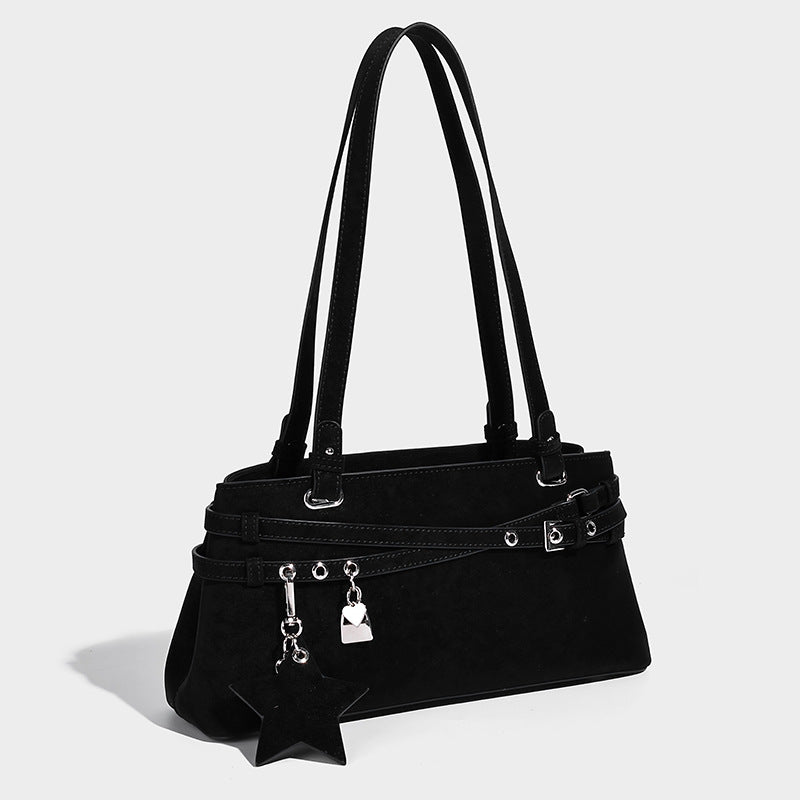 Structured trapezoid shoulder tote in dark brown matte suede-look finish with dual straps, wraparound belt bands