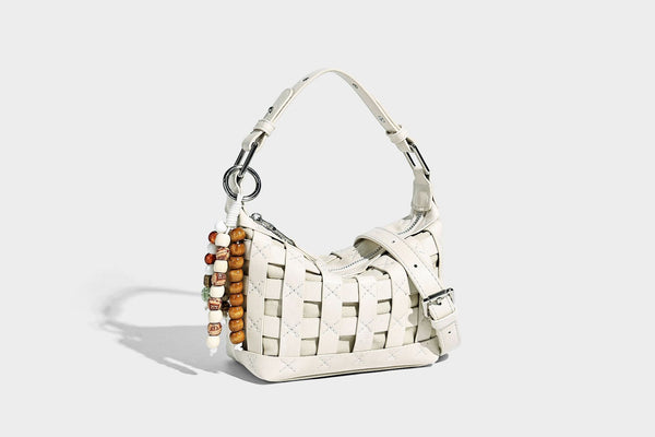 Small woven convertible shoulder bag with top zipper, silver-tone hardware, and detachable crossbody strap, detail view 21