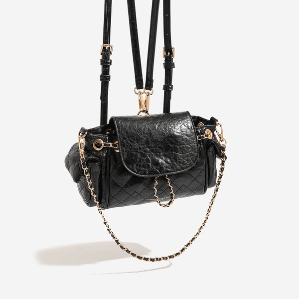 Small quilted diamond-pattern chain shoulder bag with flap closure and gold-tone hardware, front view