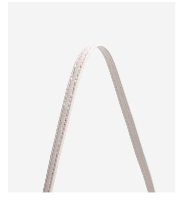 Compact soft rounded zip-top shoulder bag with gold-tone hardware and adjustable crossbody strap, detail view 16