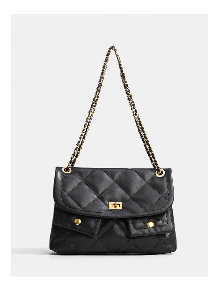 Quilted diamond flap shoulder bag with gold-tone chain strap and twist-lock closure, detail view 12