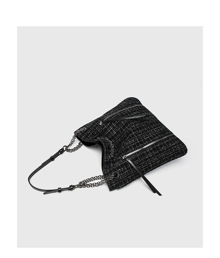 Große schwarze Schulter-Tote-Bag mit Tweedstruktur, silberfarbener Kette und Riemen in Lederoptik, Metallösen und Außenreißverschluss