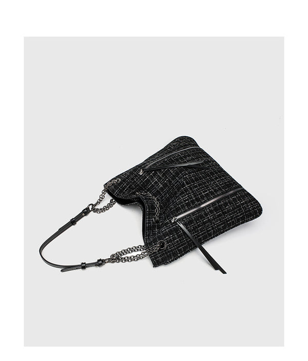 Große schwarze Schulter-Tote-Bag mit Tweedstruktur, silberfarbener Kette und Riemen in Lederoptik, Metallösen und Außenreißverschluss