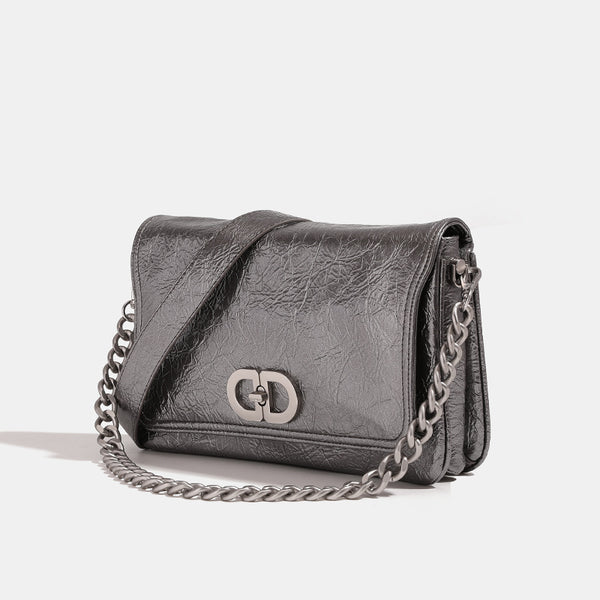 Rectangular flap shoulder bag with chunky silver-tone chain strap and crinkled leather-look finish, detail view 4
